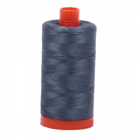 Spool of grey Aurifil Cotton Thread.