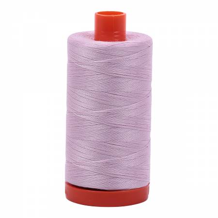 Spool of lilac Aurifil Cotton Thread.