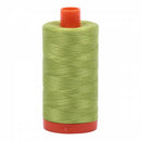 Spool of green Aurifil Cotton Thread.