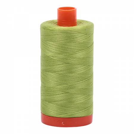 Spool of green Aurifil Cotton Thread.