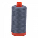 Spool of grey Aurifil Cotton Thread.