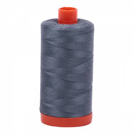 Spool of grey Aurifil Cotton Thread.