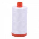 Spool of white Aurifil Cotton Thread.