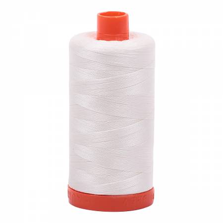 Spool of off white Aurifil Cotton Thread.
