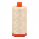 Spool of soft yellow Aurifil Cotton Thread.