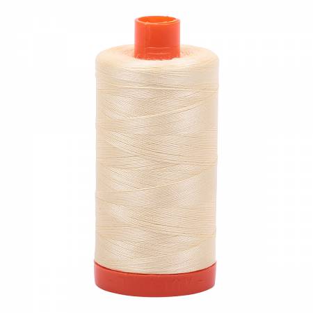 Spool of soft yellow Aurifil Cotton Thread.