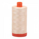 Spool of yellow Aurifil Cotton Thread.