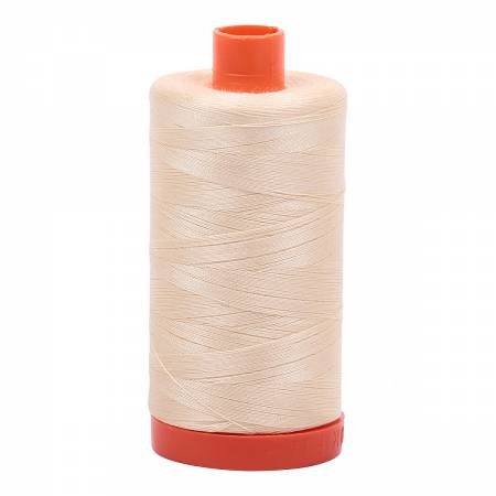 Spool of yellow Aurifil Cotton Thread.
