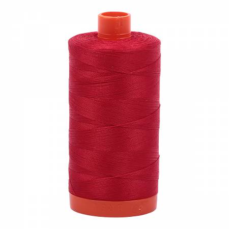 Spool of red Aurifil Cotton Thread.