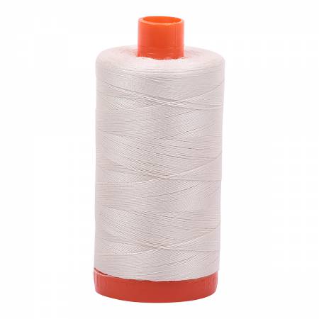 Spool of off white Aurifil Cotton Thread.