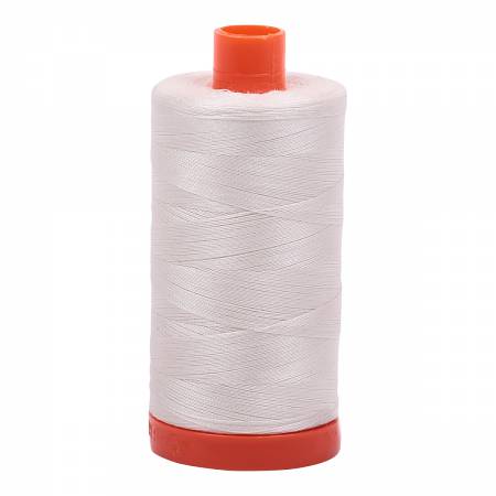 Spool of white Aurifil Cotton Thread.