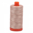 Spool of beige Aurifil Cotton Thread