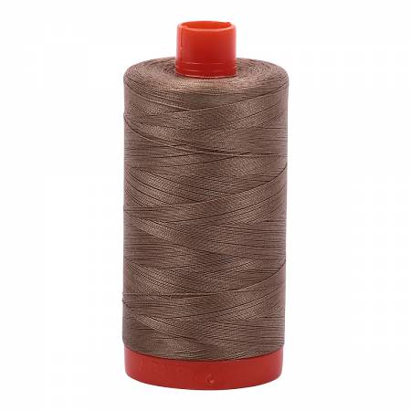 Spool of brown Aurifil Cotton Thread.