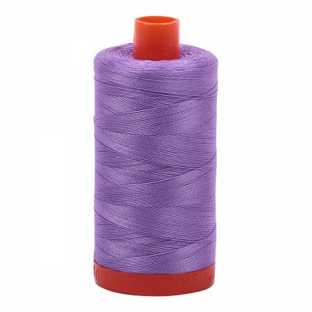 Spool of purple Aurifil Cotton Thread.