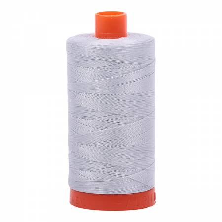 Spool of grey Aurifil Cotton Thread.