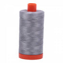 Spool of grey Aurifil Cotton Thread.