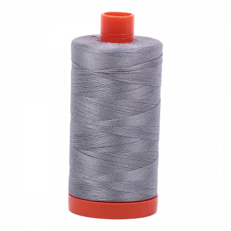 Spool of grey Aurifil Cotton Thread.