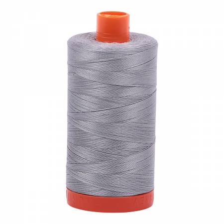 Spool of grey Aurifil Cotton Thread.