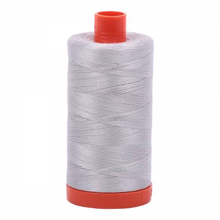 Spool of grey Aurifil Cotton Thread.