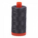 Spool of grey Aurifil Cotton Thread.