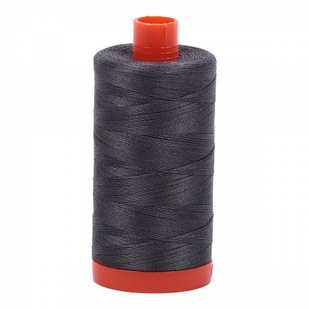 Spool of grey Aurifil Cotton Thread.