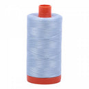 Spool of light blue Aurifil Cotton Thread.