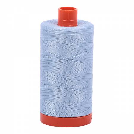 Spool of light blue Aurifil Cotton Thread.