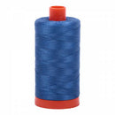 Spool of blue Aurifil Cotton Thread.