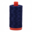 Spool of blue Aurifil Cotton Thread.