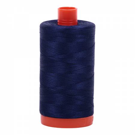 Spool of blue Aurifil Cotton Thread.