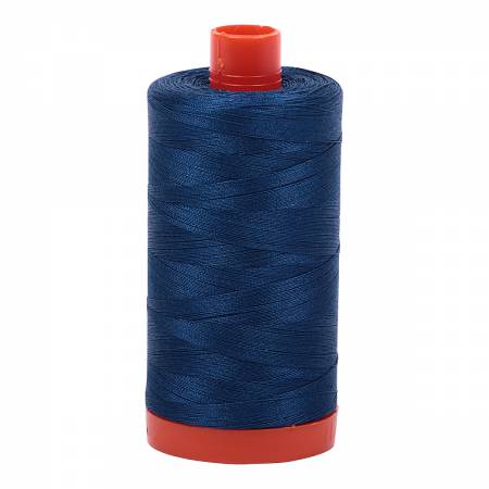 Spool of blue Aurifil Cotton Thread.