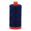 Spool of blue Aurifil Cotton Thread.