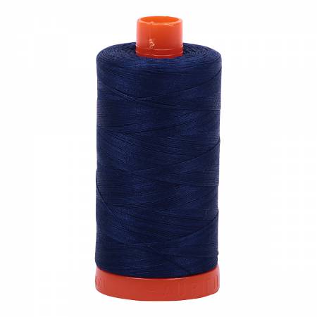 Spool of blue Aurifil Cotton Thread.