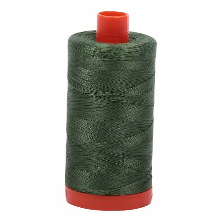 Spool of green Aurifil Cotton Thread.