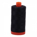 Spool of grey Aurifil Cotton Thread.