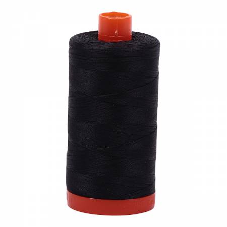Spool of grey Aurifil Cotton Thread.