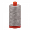 Spool of grey Aurifil Cotton Thread.