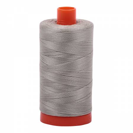 Spool of grey Aurifil Cotton Thread.