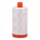Spool of off white Aurifil Cotton Thread.