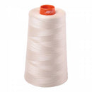 Cone of beige Aurifil Cotton Thread.